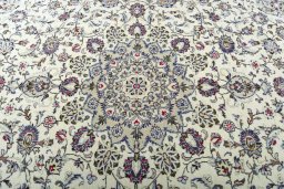 Central medallion detail of 2000s Kashan rug from Iran / Persia