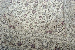 Close-up detail of 2000s Kashan rug from Iran / Persia showing Wool weave