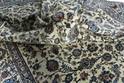 Surface texture of 2000s Kashan rug with natural Wool and intricate pattern