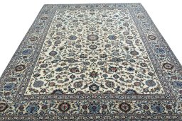 Surface texture of 2000s Kashan rug with natural Wool and intricate pattern