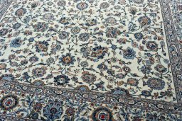 Close-up detail of 2000s Kashan rug from Iran / Persia showing Wool weave