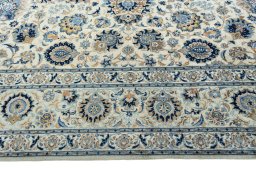 Corner detail of 1970s Kashan rug showing border pattern and Cork pile