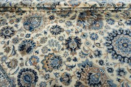 Surface texture of 1970s Kashan rug with natural Cork and intricate pattern