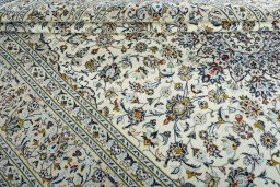 Close-up detail of 2000s Kashan rug from Iran / Persia showing Wool weave
