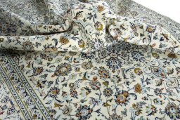 Surface texture of 2000s Kashan rug with natural Wool and intricate pattern