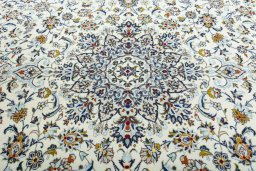 Central medallion detail of 2000s Kashan rug from Iran / Persia