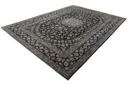 Corner detail of 2000s Kashan rug showing border pattern and Wool pile