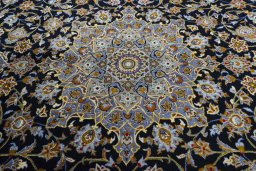 Central medallion detail of 2000s Kashan rug from Iran / Persia