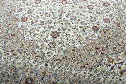 Close-up detail of 2000s Kashan rug from Iran / Persia showing Wool weave