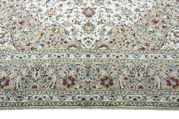 Full view of 2000s Kashan rug from Iran / Persia, 404 × 295 cm in Beige tones