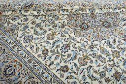 Close-up detail of 2000s Kashan rug from Iran / Persia showing Wool weave