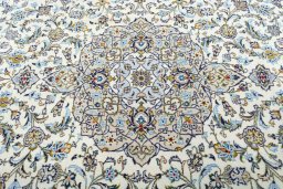Central medallion detail of 2000s Kashan rug from Iran / Persia