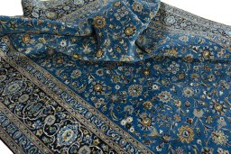 Surface texture of 2000s Kashan rug with natural Wool and intricate pattern