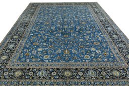 Surface texture of 2000s Kashan rug with natural Wool and intricate pattern