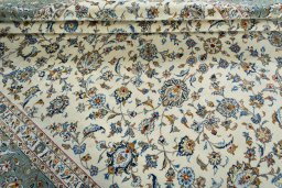 Close-up detail of 2000s Kashan rug from Iran / Persia showing Wool weave