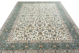Surface texture of 2000s Kashan rug with natural Wool and intricate pattern
