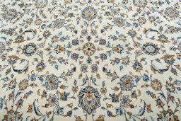 Central medallion detail of 2000s Kashan rug from Iran / Persia