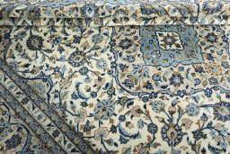 Close-up detail of 2000s Kashan rug from Iran / Persia showing Wool weave