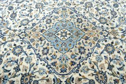Central medallion detail of 2000s Kashan rug from Iran / Persia