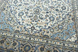 Close-up detail of 2000s Kashan rug from Iran / Persia showing Wool weave
