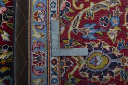 Central medallion detail of 2000s Kashan rug from Iran / Persia