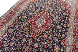 Central medallion detail of 2000s Kashan rug from Iran / Persia