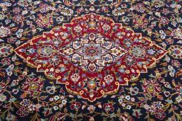 Close-up detail of 2000s Kashan rug from Iran / Persia showing Wool weave