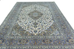 Surface texture of 2000s Kashan rug with natural Cork and intricate pattern