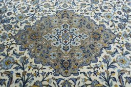 Central medallion detail of 2000s Kashan rug from Iran / Persia
