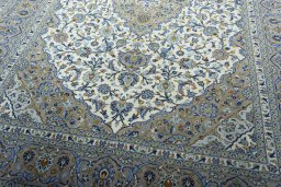 Close-up detail of 2000s Kashan rug from Iran / Persia showing Cork weave