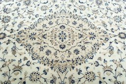 Central medallion detail of 2000s Kashan rug from Iran / Persia