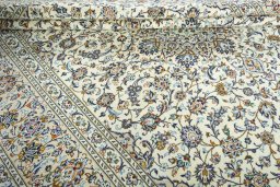 Close-up detail of 2000s Kashan rug from Iran / Persia showing Wool weave