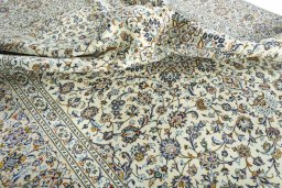 Surface texture of 2000s Kashan rug with natural Wool and intricate pattern