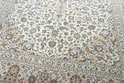 Close-up detail of 2000s Kashan rug from Iran / Persia showing Wool weave