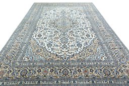 Surface texture of 2000s Kashan rug with natural Wool and intricate pattern