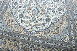 Close-up detail of 2000s Kashan rug from Iran / Persia showing Wool weave