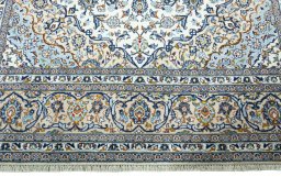 Full view of 2000s Kashan rug from Iran / Persia, 375 × 244 cm in Beige tones