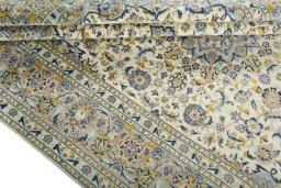 Close-up detail of 2000s Kashan rug from Iran / Persia showing Wool weave