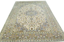 Surface texture of 2000s Kashan rug with natural Wool and intricate pattern