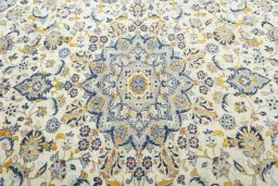 Central medallion detail of 2000s Kashan rug from Iran / Persia