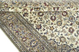 Close-up detail of 2000s Kashan rug from Iran / Persia showing Wool weave