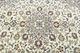 Central medallion detail of 2000s Kashan rug from Iran / Persia