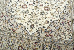Close-up detail of 2000s Kashan rug from Iran / Persia showing Wool weave