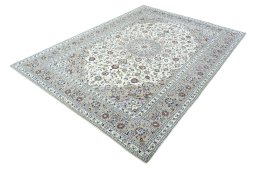 Corner detail of 2000s Kashan rug showing border pattern and Wool pile