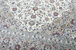 Close-up detail of 2000s Kashan rug from Iran / Persia showing Wool weave