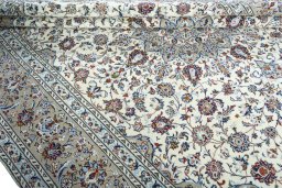 Close-up detail of 2000s Kashan rug from Iran / Persia showing Wool weave
