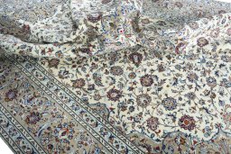 Surface texture of 2000s Kashan rug with natural Wool and intricate pattern