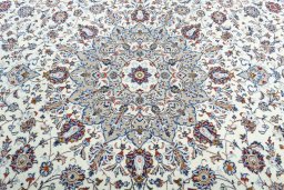 Central medallion detail of 2000s Kashan rug from Iran / Persia
