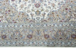 Full view of 2000s Kashan rug from Iran / Persia, 403 × 294 cm in Beige tones