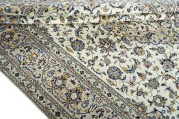 Close-up detail of 2000s Kashan rug from Iran / Persia showing Wool weave